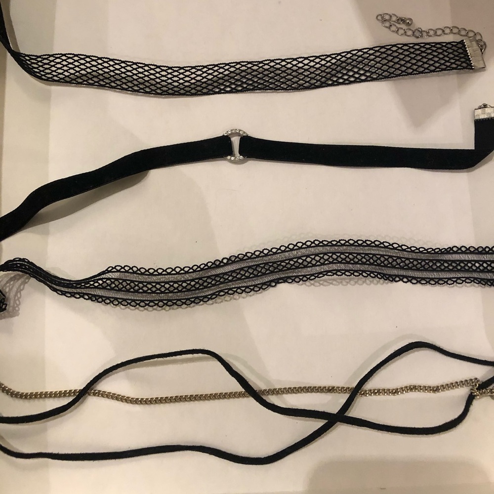 Forever 21 set of four chocker necklaces.